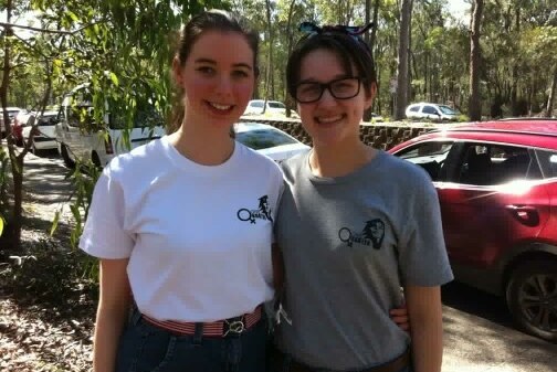 Young women wearing One Quarter t-shirts
