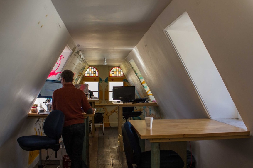 The top floor in the attic is now a shared office space