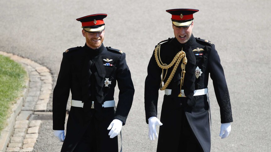Prince Harry and Prince William arrive for his wedding.