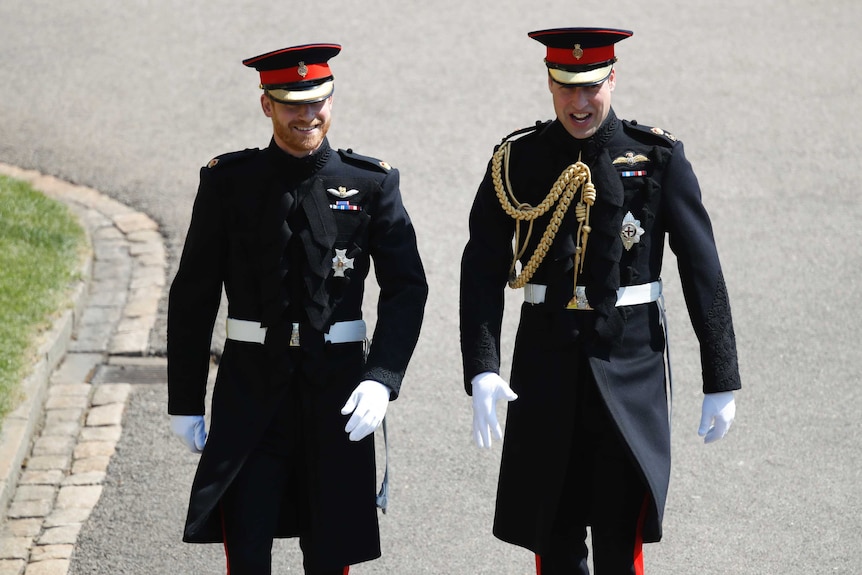 Prince Harry and Prince William arrive for his wedding.