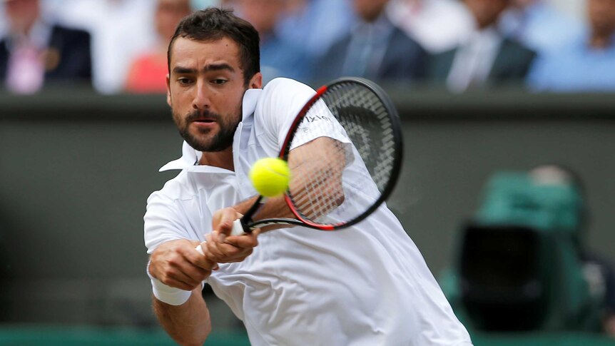 Marin Cilic hits the ball during the Wimbledon final.