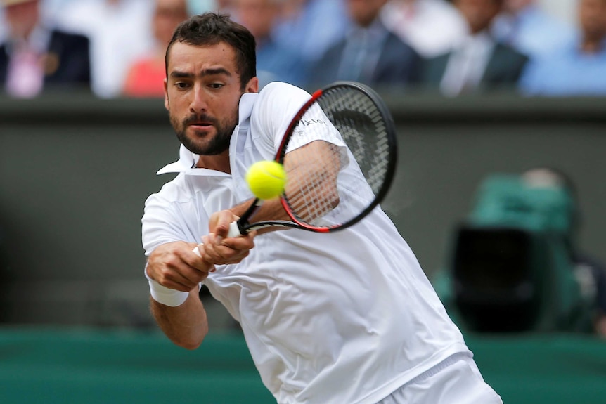 Marin Cilic hits the ball during the Wimbledon final.