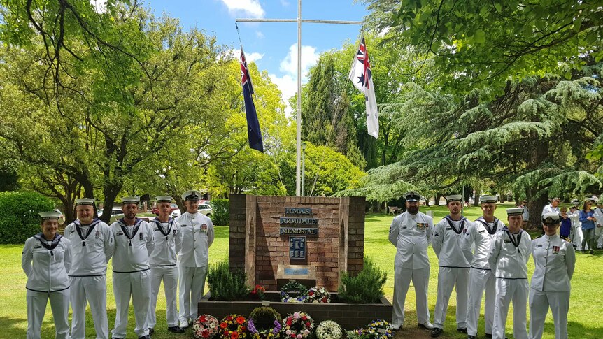 Navy representatives at the memorial in Armidale, NSW.