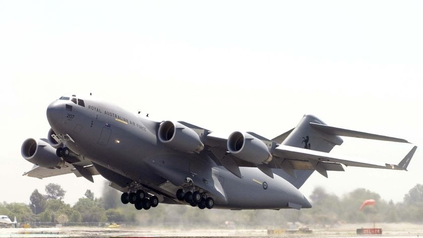 An RAAF C-17 Globemaster III aircraft takes off