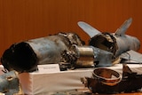 Remains of what was described as a misfired Iranian cruise missile, displayed during a Saudi military press conference.