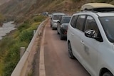 Cars line up on a highway in Tibet, China