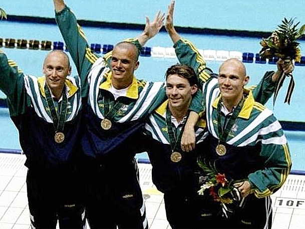 Theft of medals reported: Phil Rogers (left) with his medley relay medal
