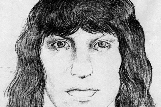 Black and white sketch of a man with long black hair