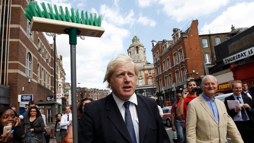 Boris Johnson joins riots clean-up