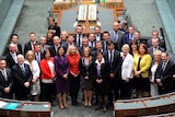Newly elected federal MPs pose for a photo in the House of Representatives.