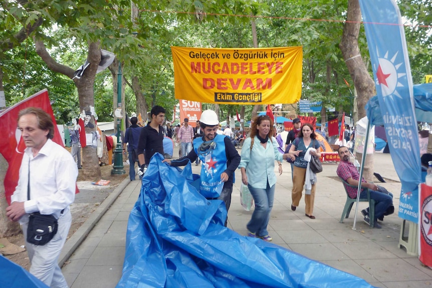 A sign reads "Continue to struggle for freedom and the future" in Gezi Park after protesters took control of the area.