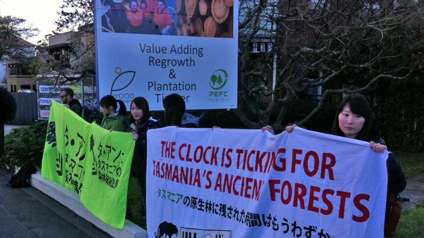Japanese activists join an anti-logging protest outside Ta Ann Tasmania headquarters in Hobart.