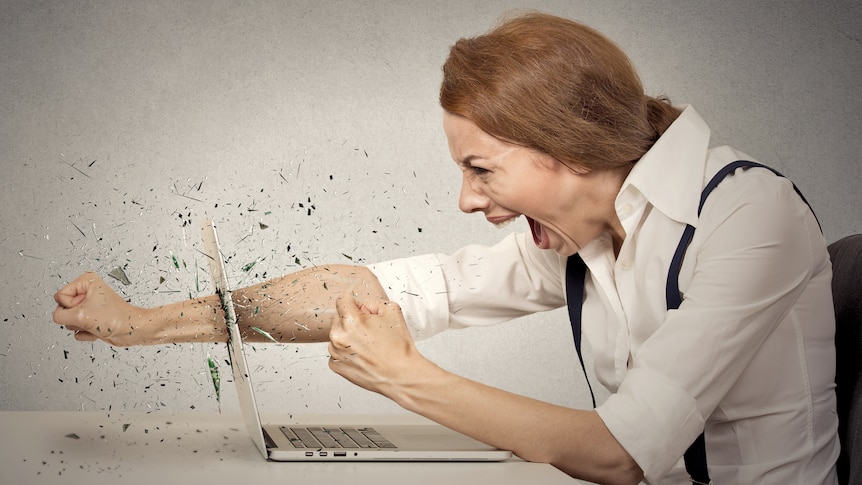 Angry woman punching her screen