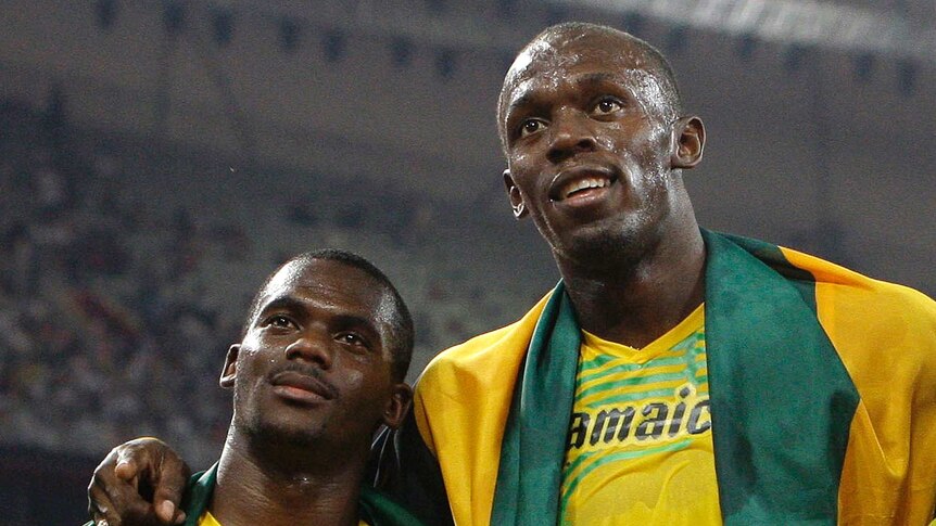 Bolt and Carter of the 2008 Olympics Jamaican 100m relay team.