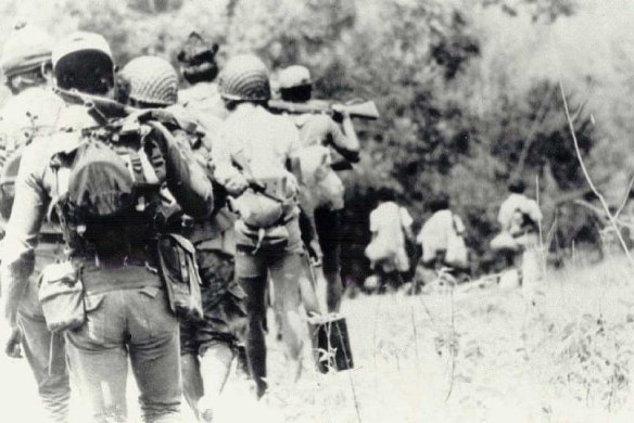 Indonesian troops on the march in East Timor, 1975