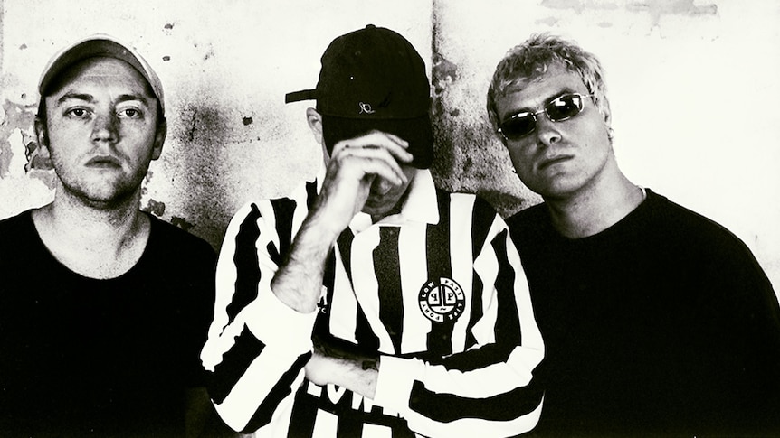 A 2021 black and white press shot of DMA'S