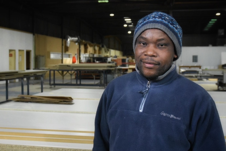 Bacumi Niyibigira at the Hamilton joinery where he works.
