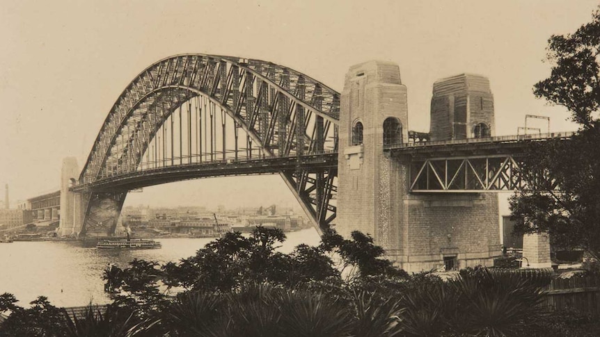 An old photo of a newly completed Sydney Harbour Bridge
