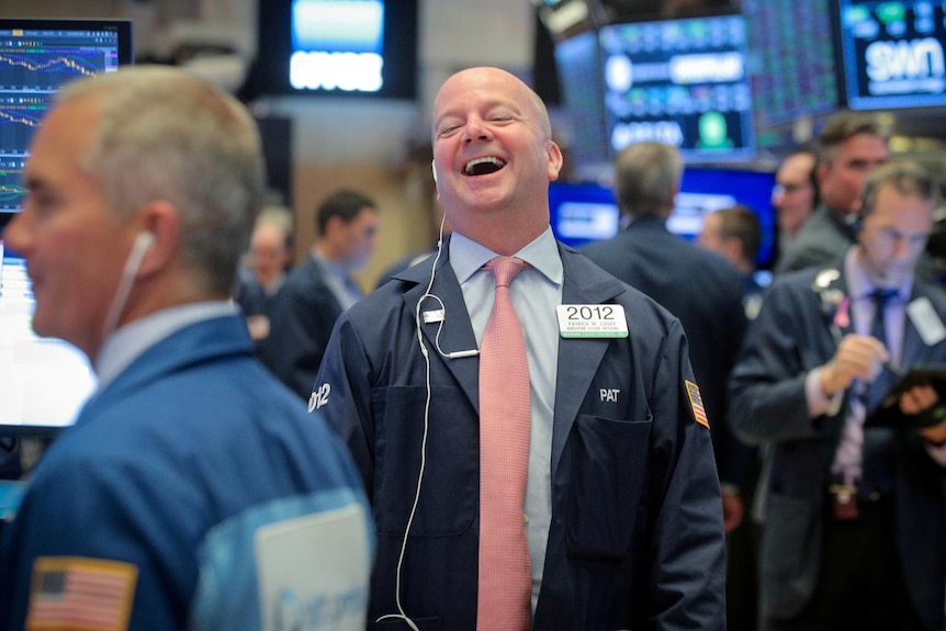 Wall St trader laughing