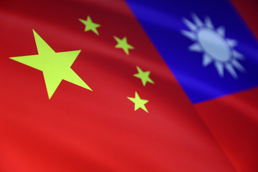 A graphic of a Chinese flag next to Taiwanese fla.