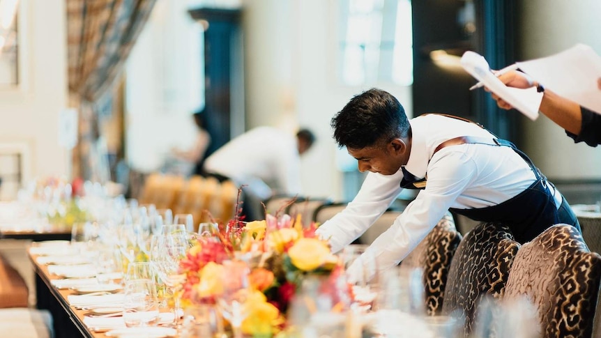 A generic photo of a hotel worker.