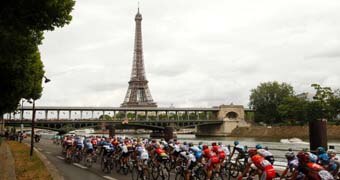 Tour de France riders during the 20th stage ride past the Eiffel Tower