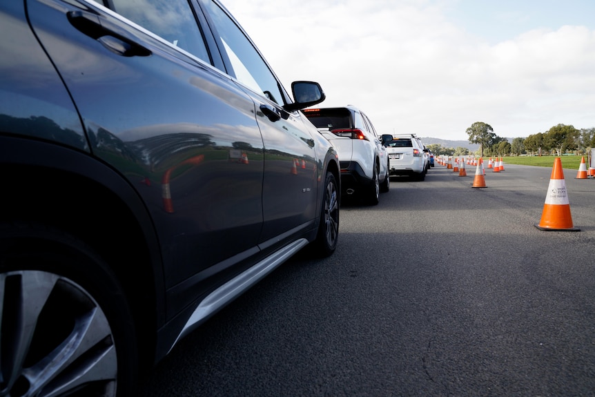A long queue of cars at the Victoria Park coronavirus testing station.