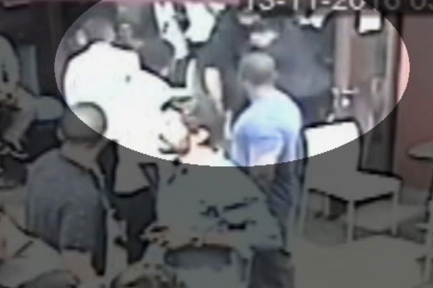 A grainy picture taken from CCTV footage showing a fight involving Fremantle Dockers defender Michael Johnson in a kebab shop.