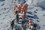 Injured person carried off mountain