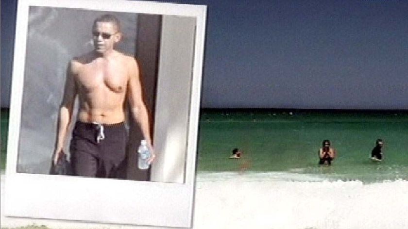 Barack Obama goes shirtless while on holiday in Hawaii