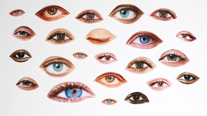 A collage of eyes from different people. They're on a white background like they've been scrapbooked. 