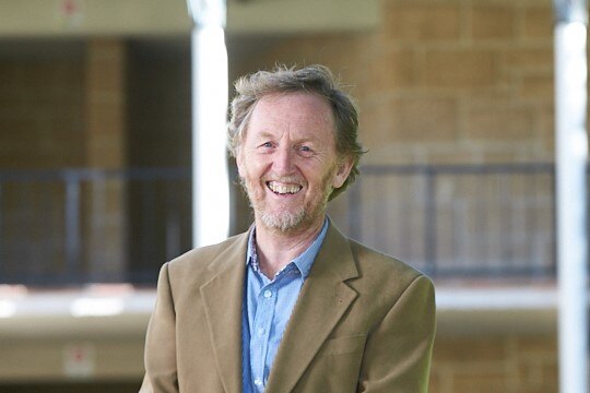 Professor John Kinder, an internationally recognised linguist, professor and author.
