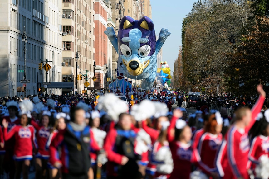 The Bluey balloon floats in the Macy's Thanksgiving Day Parade