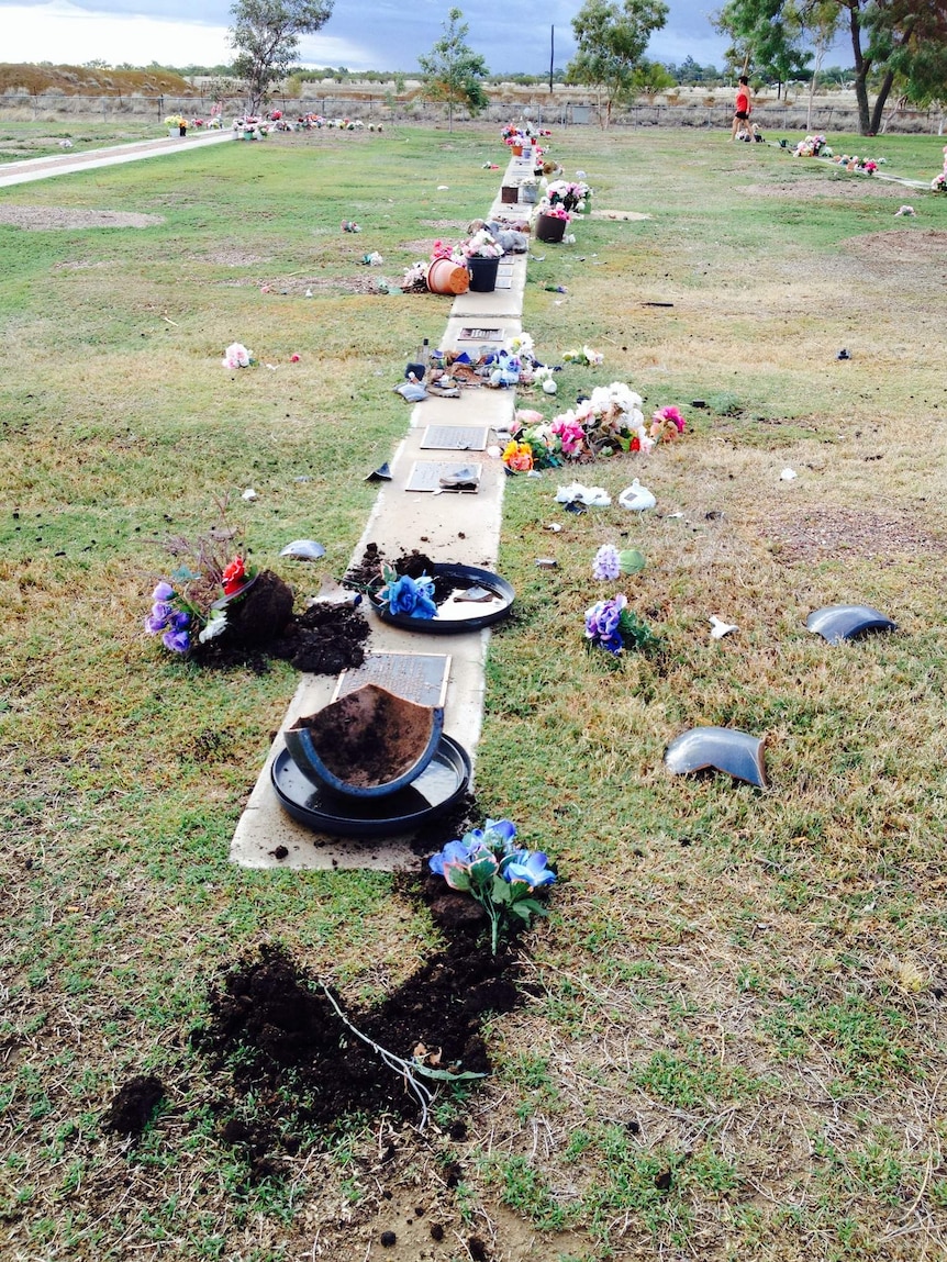 Vandalised gravesites at cemetery in Longreach in western Qld in February 2014