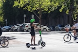 Woman on an e-scooter in Melbourne