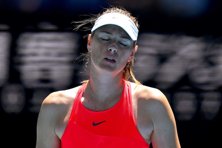 Maria Sharapova closes her eyes and looks tired on court at the Australian Open.
