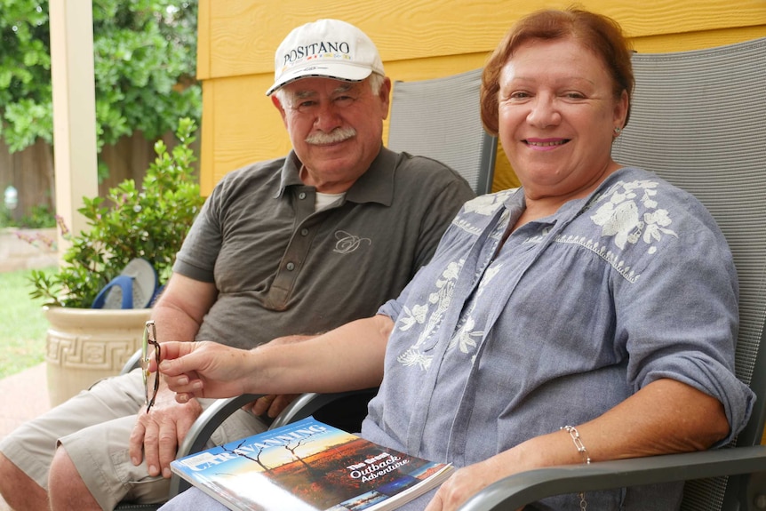Maria and Tony Taranto sit in their backyard in Sydney, March 2020.