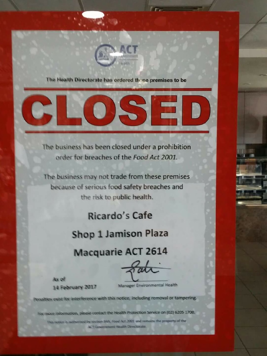 ACT Government prohibition notice stuck to the door of Ricardo's Cafe in Jamison.