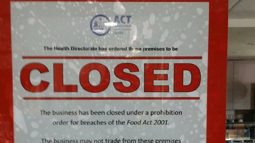 ACT Government prohibition notice stuck to the door of Ricardo's Cafe in Jamison.
