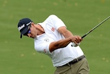 Adam Scott of Australia plays a shot on the 17th hole during day three of the 2014 Australian PGA Championship at Royal Pines Resort