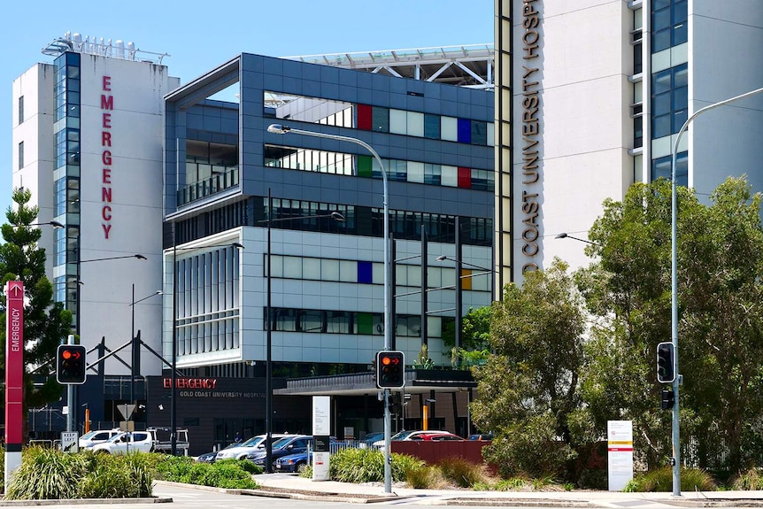 Exterior of modern Gold Coast University Hospital emergency entrance at Southport.