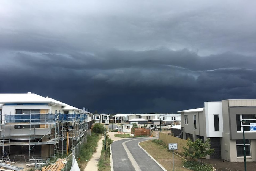 Storm clouds over a Mango Hill housing site.