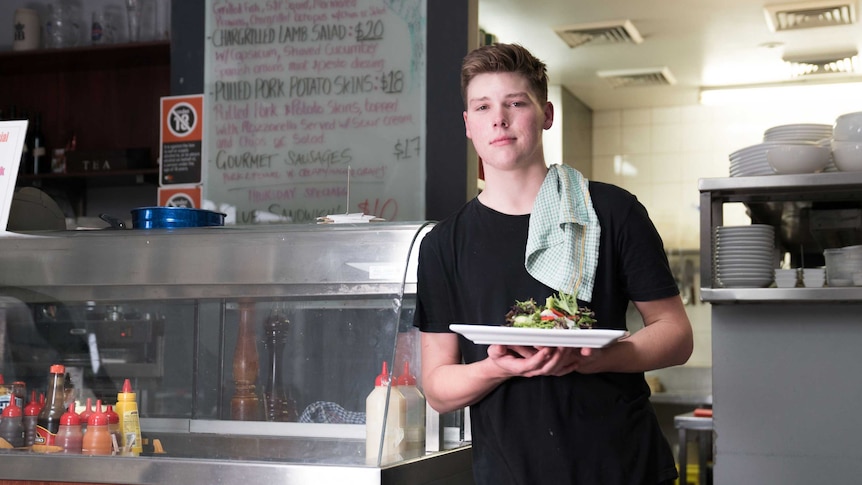 Kitchenhand Brendan Evans, 19, posing for a photo at The Dunkirk pub in Pyrmont