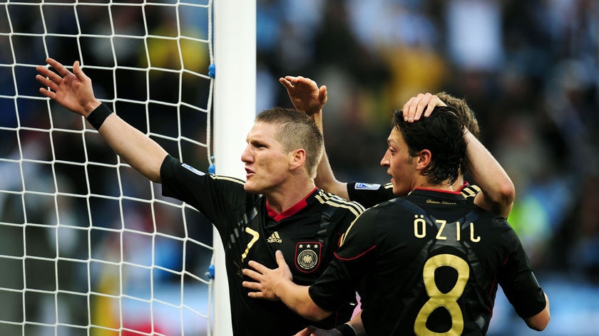 Perfect match: Mesut Ozil and Bastian Schweinsteiger have been linchpins for Germany's campaign.