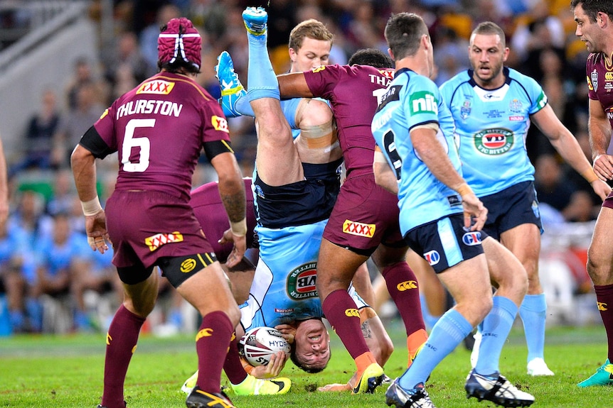 Paul Gallen is dropped on his head by Sam Thaiday