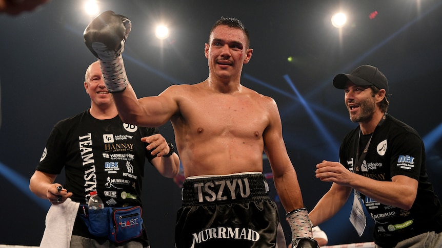 Tim Tszyu celebrates after defeating Dennis Hogan