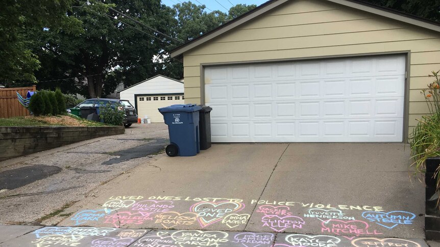 A woman on Sunday drew colourful chalk hearts on the driveway pad where the woman was shot.