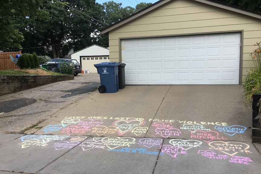 A woman on Sunday drew colourful chalk hearts on the driveway pad where the woman was shot.
