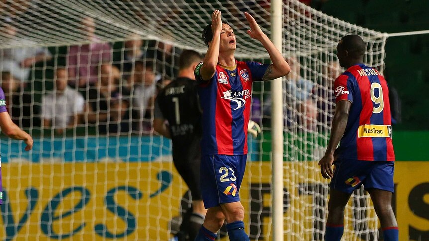 Ryan Griffiths of the Jets reacts to missing a shot on goal during round 11 against the Perth Glory in 2012.