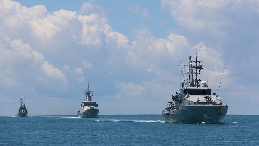 KRI Sampari and KRI Layang work alongside HMAS Wollongong during Exercise Cassowary, in waters north of Darwin.